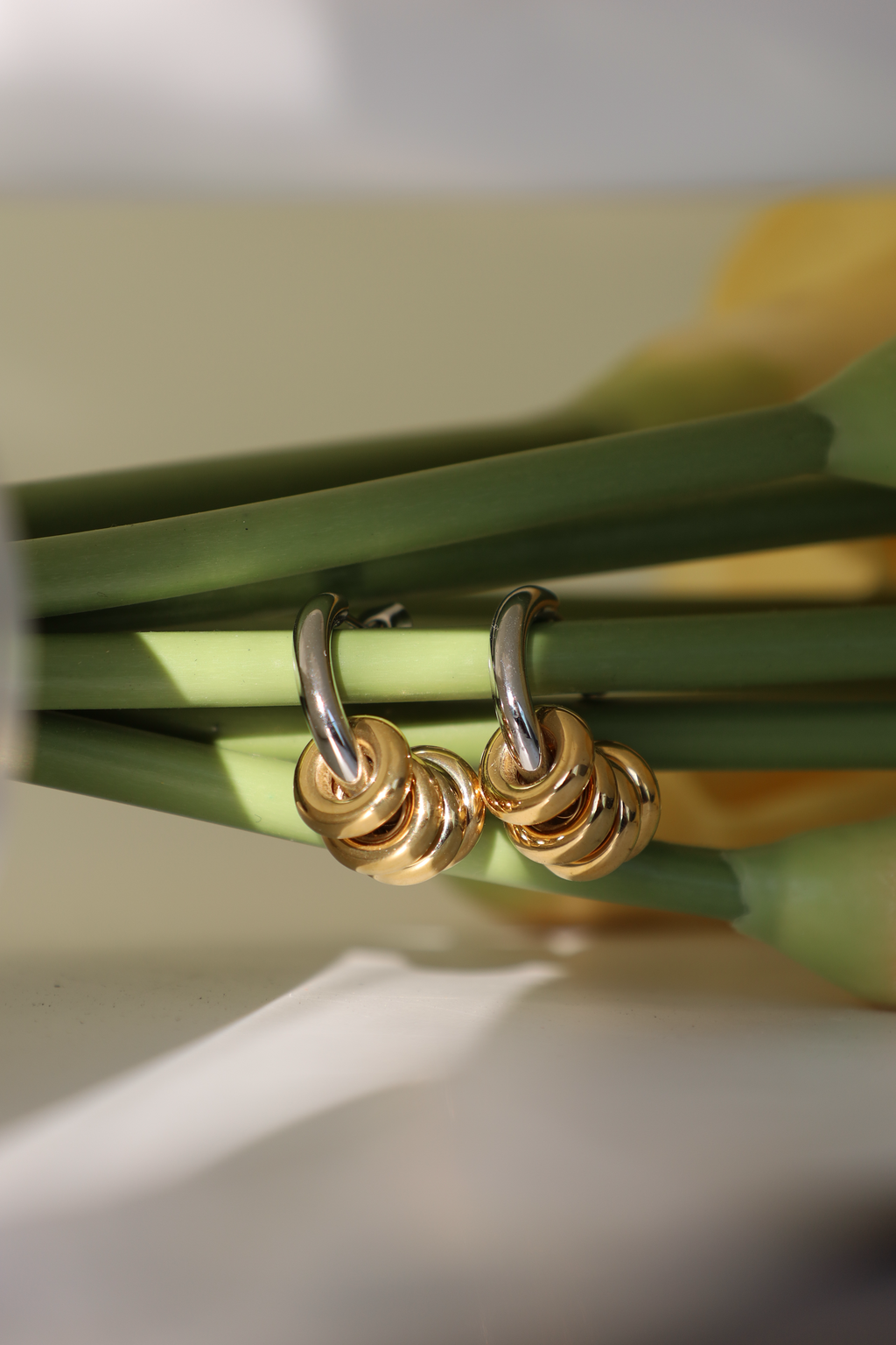 Two Tone Interlocked Hoop Earrings