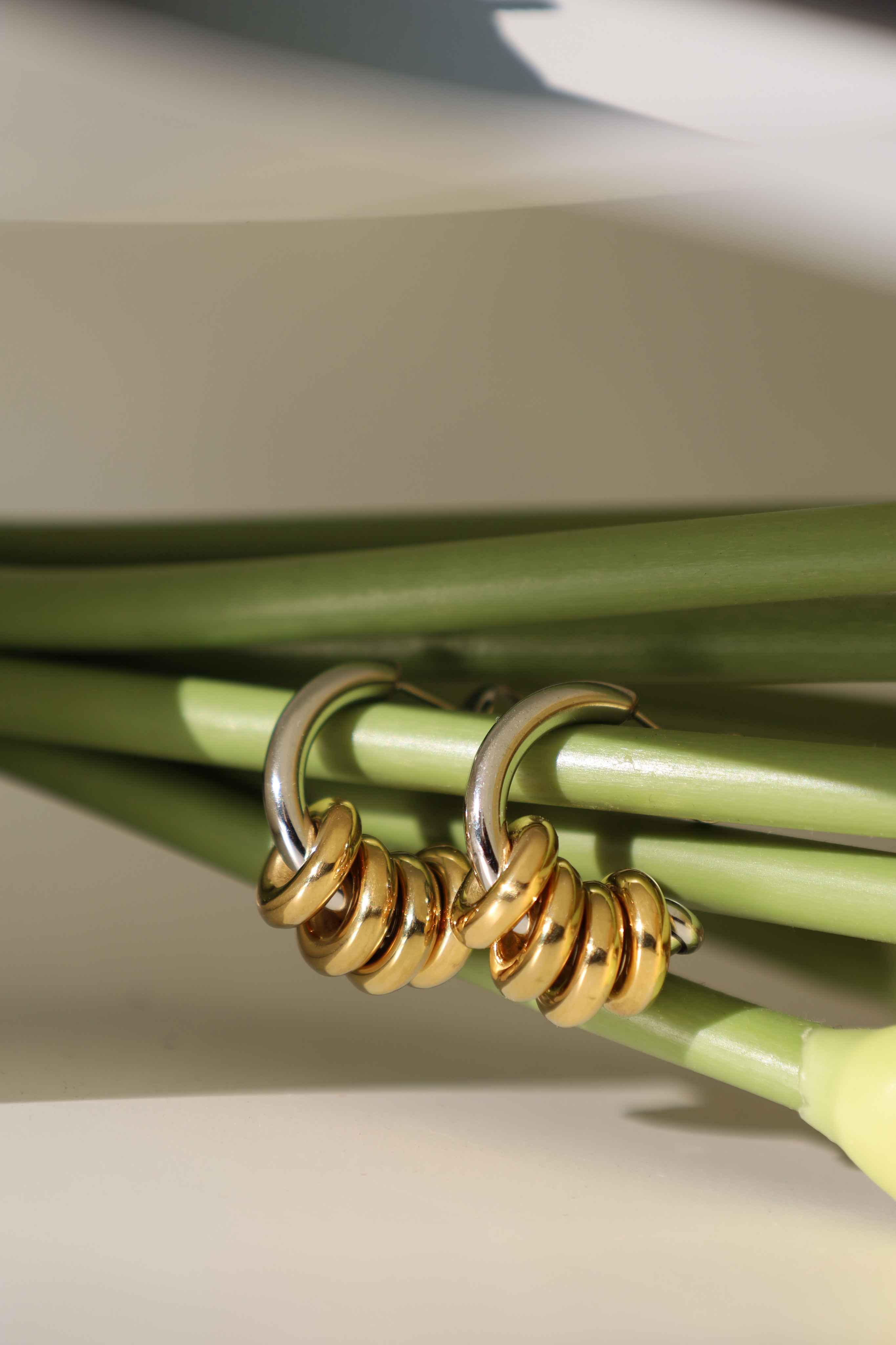 Two Tone Interlocked Hoop Earrings
