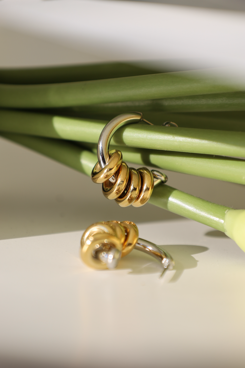 Two Tone Interlocked Hoop Earrings